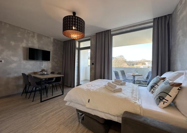 NEWDAY | NA PREDAJ 2-izbový apartmán + KK (39,3 m2) + lodžia 8,9 m2 | Jánsky rezort - Liptovský Ján